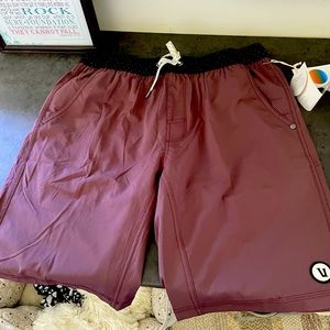 Men’s core 9” inseam with liners new with tags medium